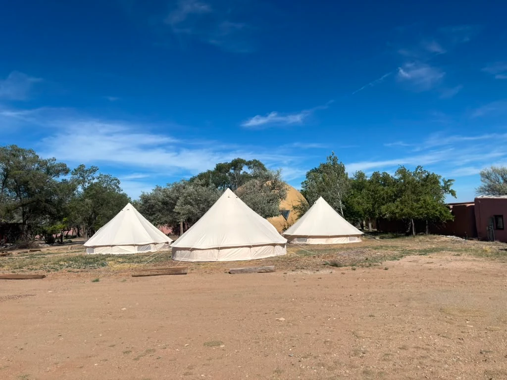 The three safari tents by the orchard